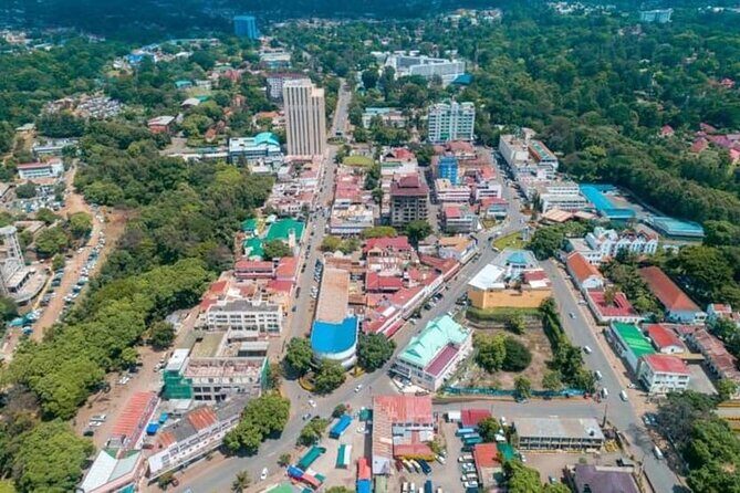 Arusha City Culture and Historical Walking Tour - Arusha Chini neighborhood hour: markets, local shops, and a quick taste of daily life