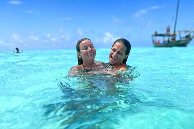 Dolphin Tour & Snorkeling at Mnemba Island - Zanzibar City Pickup and a Private Group Day on the Water