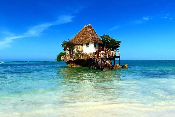 Full-day Tour Mnemba Jozani Forest Kuza Cave Paje Beach The Rock - The Rock Restaurant Zanzibar: Tides control how you get there