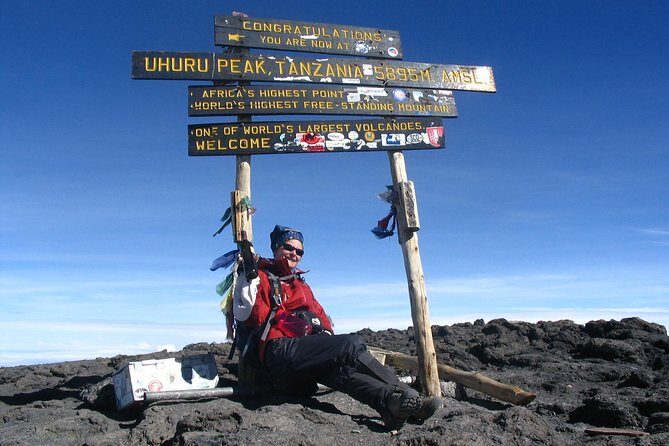 Kilimanjaro Climb • Marangu Route ~ 9 Day - Day 7 summit day to Uhuru Peak: midnight wake-up, crater rim, sunrise views