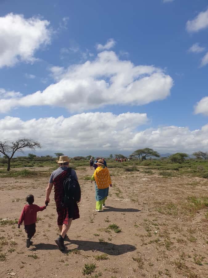 Maasai Boma Cultural Experience (maasai village tour) - The welcome: songs, greeting, and getting dressed the Maasai way