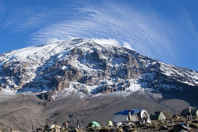 Mt Kilimanjaro Climbing; 6 Days Machame route - Day 2 to Shira Camp: moorland walking with Kibo and Mount Meru views