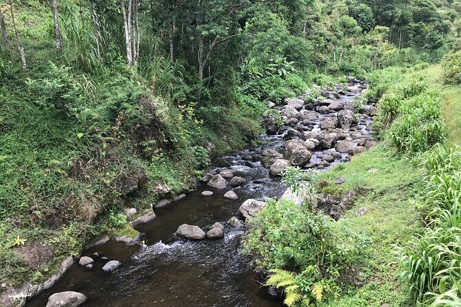 Unzip Hidden Tanzania's Attractions - Day 1 in Arusha: Lake Duluti, Napuru Waterfalls, and the Maasai Market