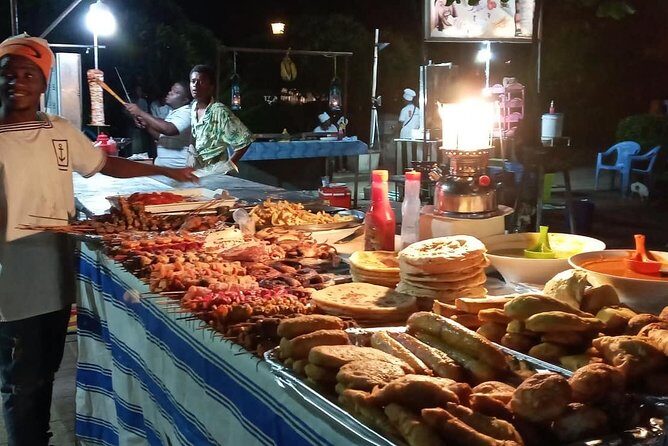 Walking Tour to The heart of Zanzibar ( STONE TOWN CITY) - Darajani Bazaar at night: fish, meat, spices, and how locals shop