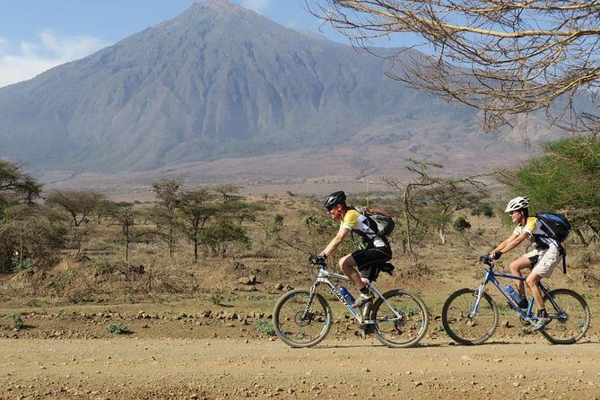 West Kilimanjaro cycling Adventures - Day 1 evening: sunset moments, campfire time, and sleeping with Tanzania