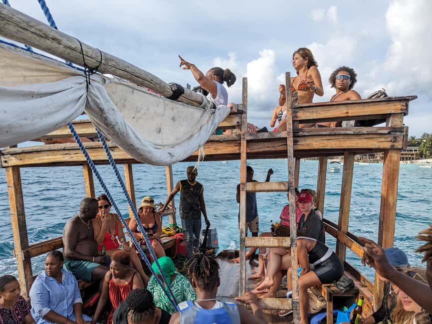 Zanzibar: African Sunset Boat Party in Zanzibar Music, Views - Timing on the Water: 4:00 PM Depart, Swim Mid-Trip, Back Around 6:45 PM