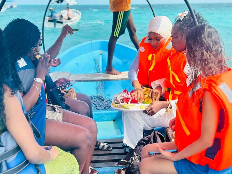 Zanzibar: Day Trip Stone Town, Spice farm,Prison Island - Stone Town walk: narrow lanes, palaces, and trade history you can see