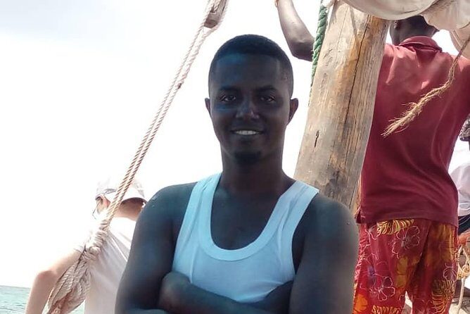 Zanzibar Dhow Cruise day adventure, sea sports at Kwale Island, very memorable - Pickup, boat setup, and what “small group” changes