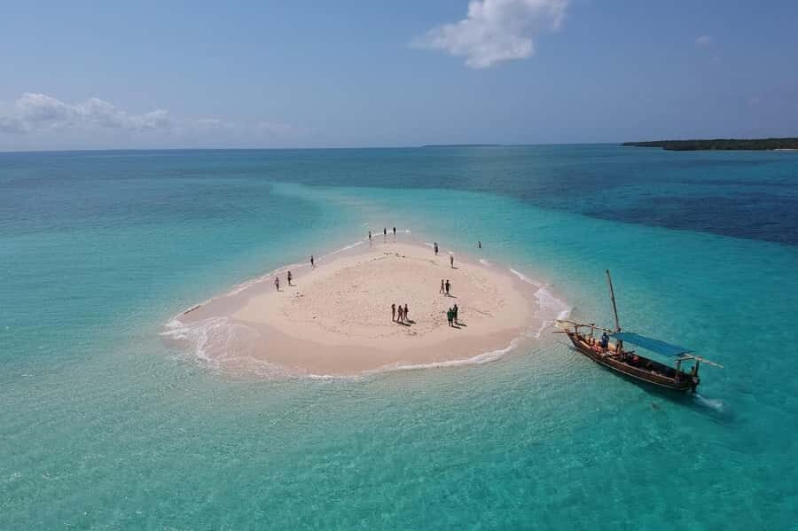 Zanzibar: Safari Blue Day trip with Snorkeling and Lunch - Zanzibar Logistics: The Van Ride, Fumba Stops, and the Dhow Segments